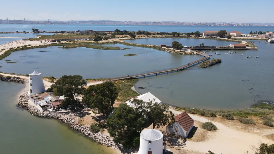 The Alburrica windmills on their spit of land at Barreiro, across the Tagus from Lisbon
