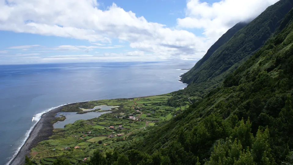 Fajã dos Cubres on the north coast of São Jorge, Azores, a shelf of flat land under the cliff